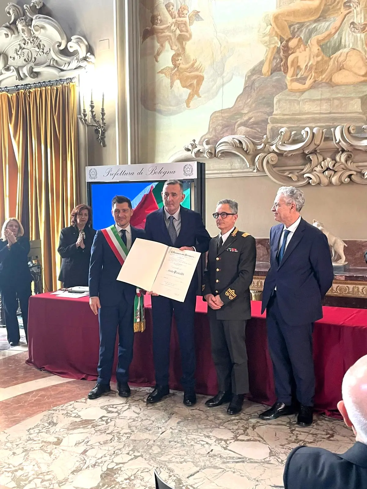 Insignito con l